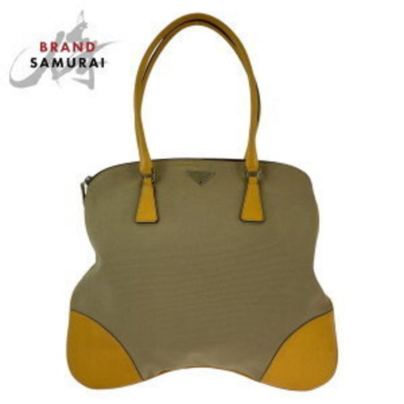 Prada triangular beige yellow Leather tote Shoulder Bag - Picture 1 of 9